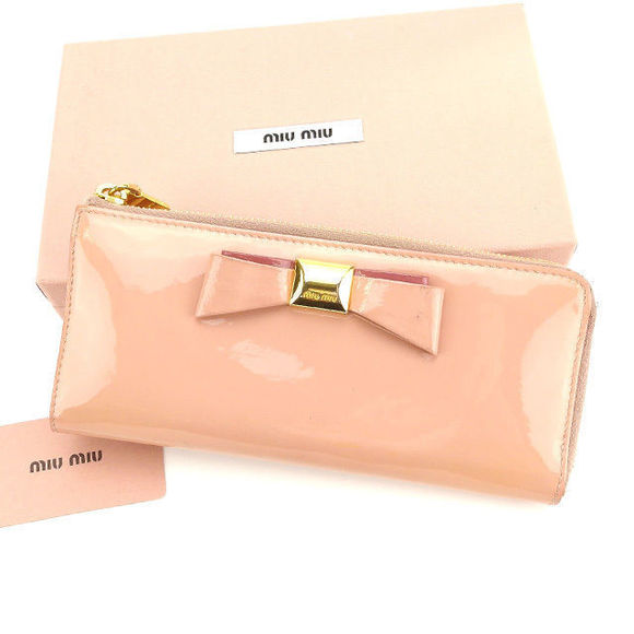 Miu Miu Handbags - Miu Miu motif Wallet pink long zipper ribbon